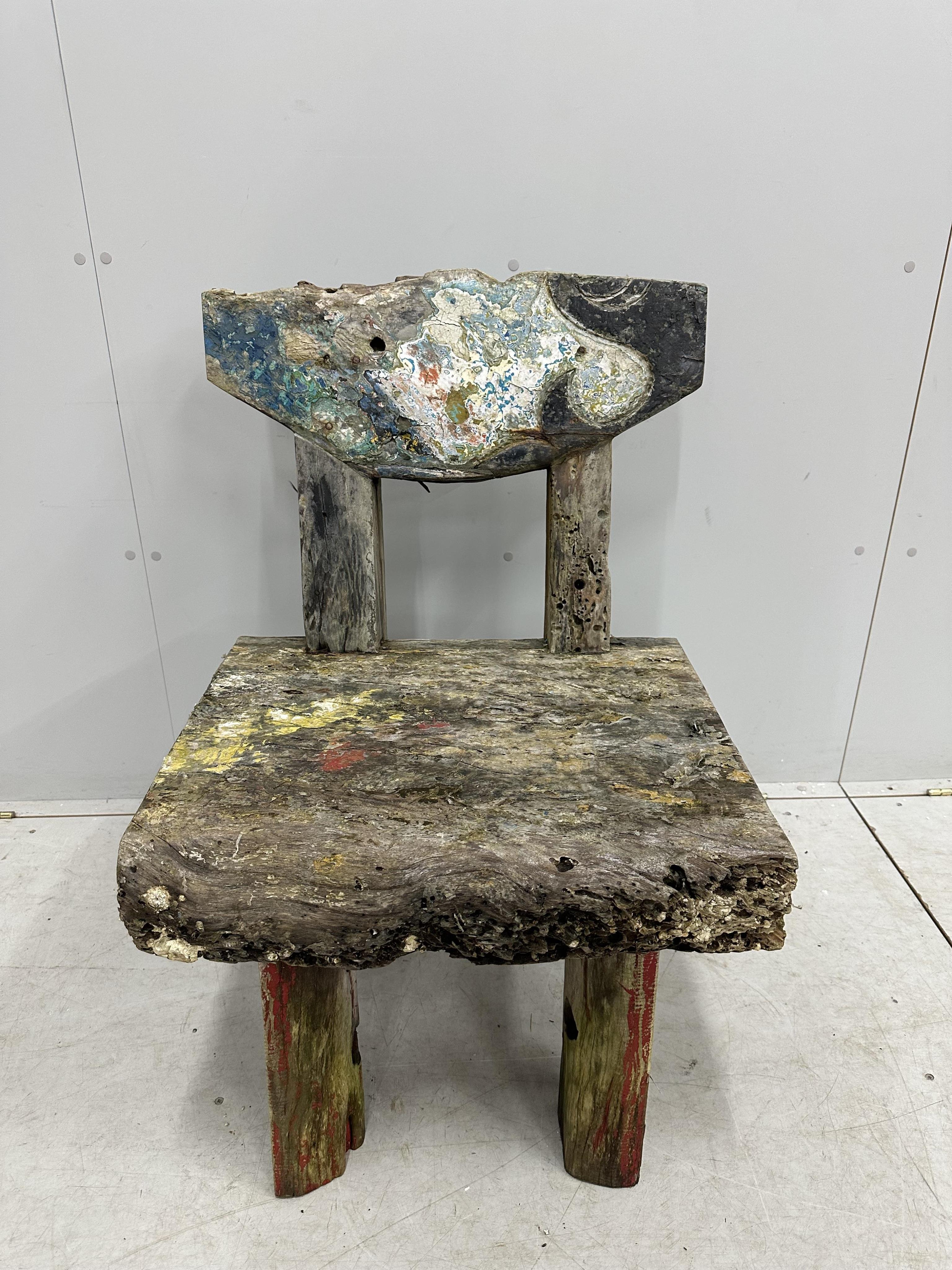 A painted primitive style chair, width 60cm, depth 53cm, height 89cm. Condition - fair